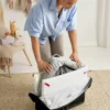 BabyBjörn Reisebett Light und Spannbetttuch im Set