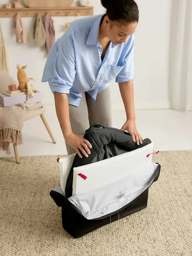 BabyBjörn Reisebett Light und Spannbetttuch im Set