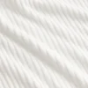 Crop-Rollkragenpullover aus Pointelle-Rippstrick