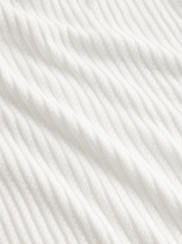 Crop-Rollkragenpullover aus Pointelle-Rippstrick