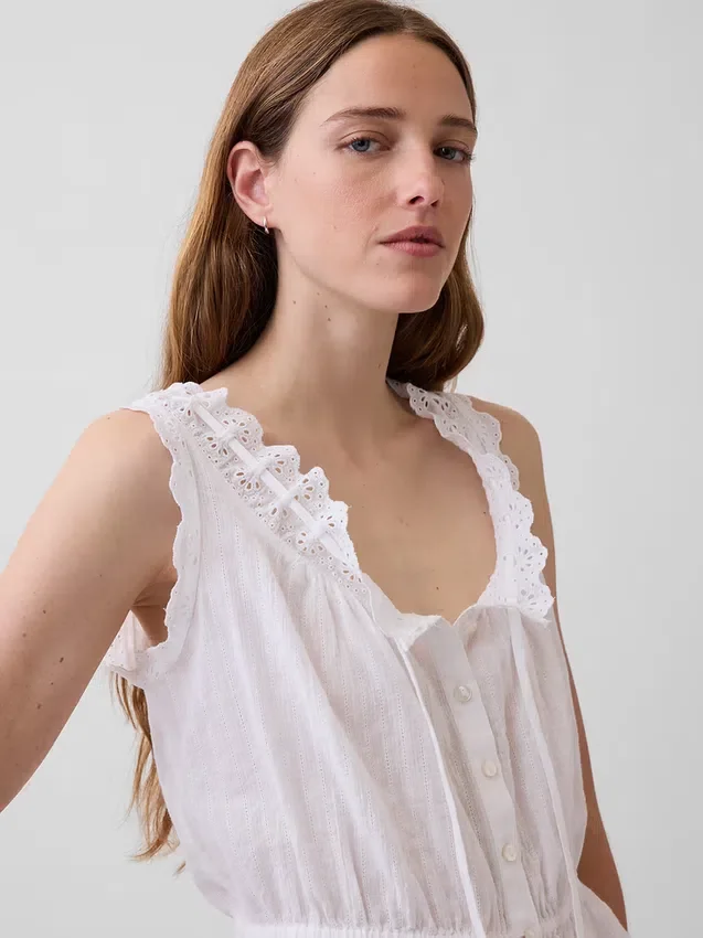Crop-Top mit Peplum und Ösen-Bindeband vorne
