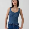 Eng anliegendes Peplum-Oberteil aus Denim