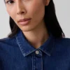 Eng anliegendes Peplum-Oberteil aus Denim