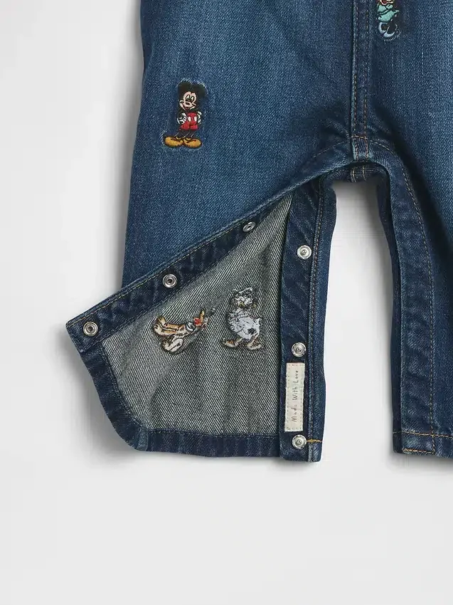GAP × Disney Baby Jeans-Latzhose