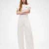 GAP × Victoria Beckham Hoch taillierte Plissee-Hose mit Bogen