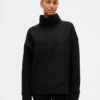 GapFit gesteppter Jacquard-Strickpullover mit Trichterkragen