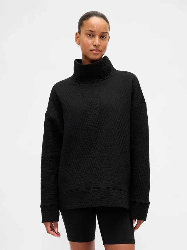 GapFit gesteppter Jacquard-Strickpullover mit Trichterkragen
