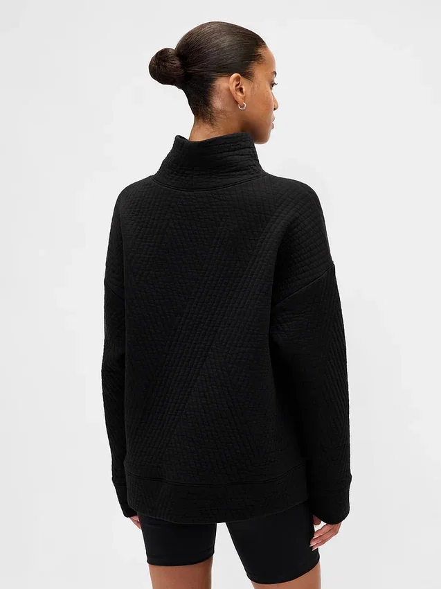 GapFit gesteppter Jacquard-Strickpullover mit Trichterkragen