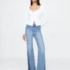 Hoch geschnittene 70er-Jahre-Flare-Jeans mit Aufnähern