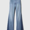 Hoch geschnittene 70er-Jahre-Flare-Jeans mit Aufnähern