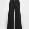 Hoch taillierte, weit geschnittene Knöchellange Jeans