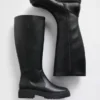 Hohe Stiefel aus veganem Leder mit Profilsohle