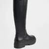 Hohe Stiefel aus veganem Leder mit Profilsohle