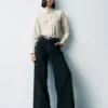 Jeans mit hoher Leibhöhe und weitem Bein