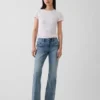 Jeans mit niedriger Leibhöhe, langem Schnitt und schmaler Passform sowie aufgesetzten Taschen