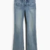Jeans mit niedriger Leibhöhe, langem Schnitt und schmaler Passform sowie aufgesetzten Taschen
