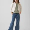 Kinder-Jeans mit niedriger Leibhöhe, Nähten und lockerem Flare-Schnitt