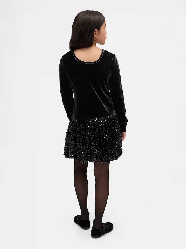 Kinder-Kleid aus verschiedenen Materialien mit Pailletten und Ballonrock