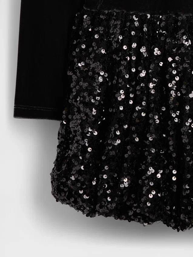Kinder-Kleid aus verschiedenen Materialien mit Pailletten und Ballonrock