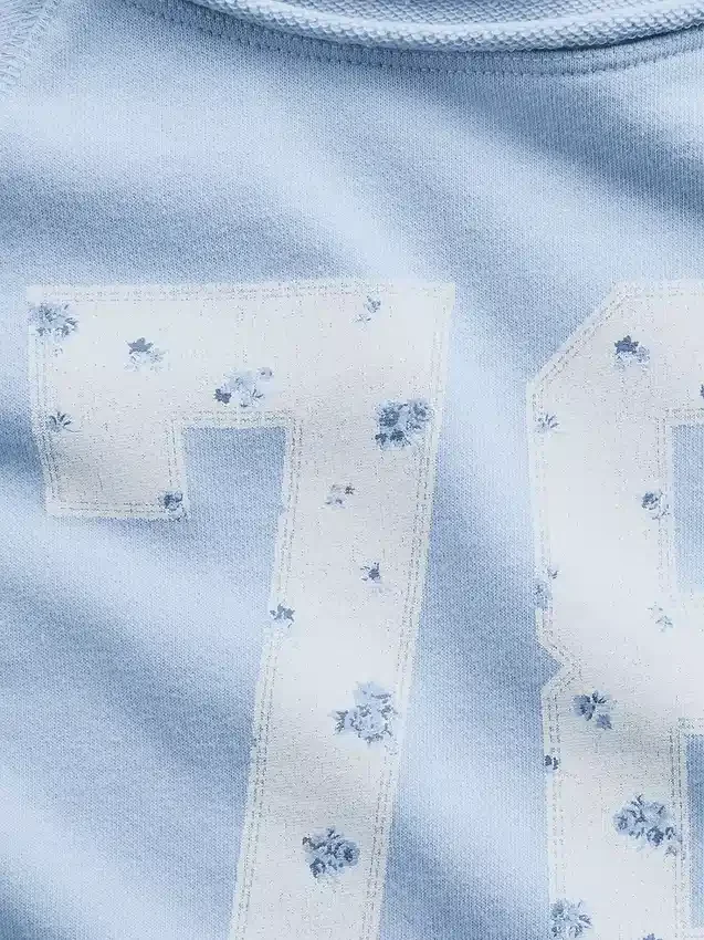 Kinder-Sweatshirt aus Vintagesoft-Frottee mit Raglanärmeln und Grafikprint
