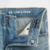 Kinderjeans mit niedriger Leibhöhe, weitem Bein und weitem Schnitt