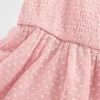 Kinderkleid aus Netzstoff mit Rüschen und Flügelärmeln