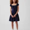 Kinderkleid mit Polka-Dots und tief sitzender Taille