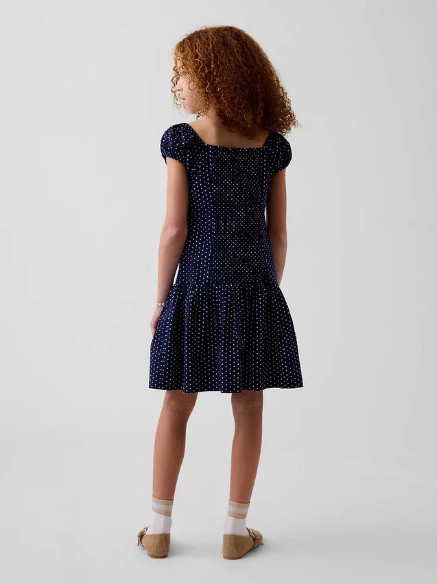 Kinderkleid mit Polka-Dots und tief sitzender Taille