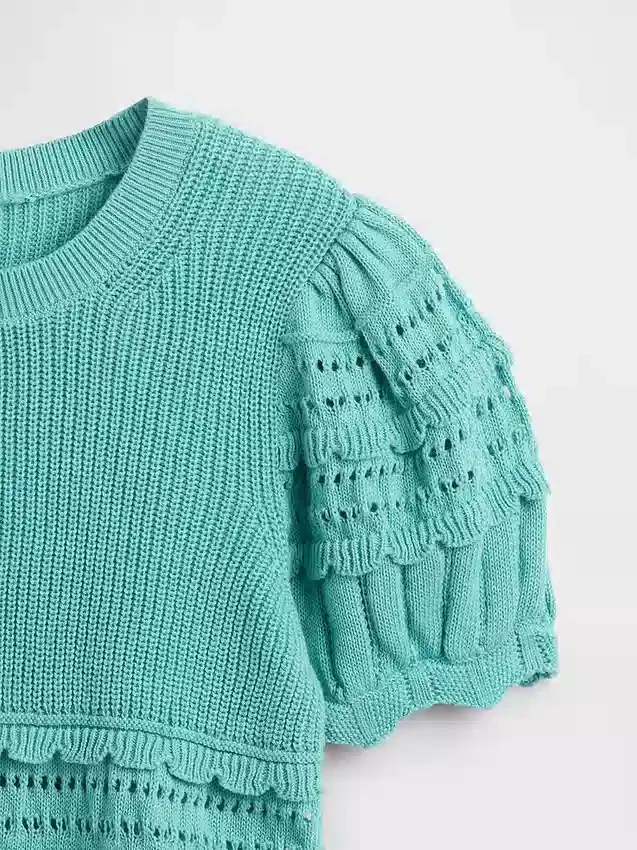 Kinderpullover mit Wellenkante und gemischten Maschen