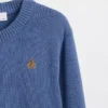 Locker sitzende, kurze Strickjacke für Kinder