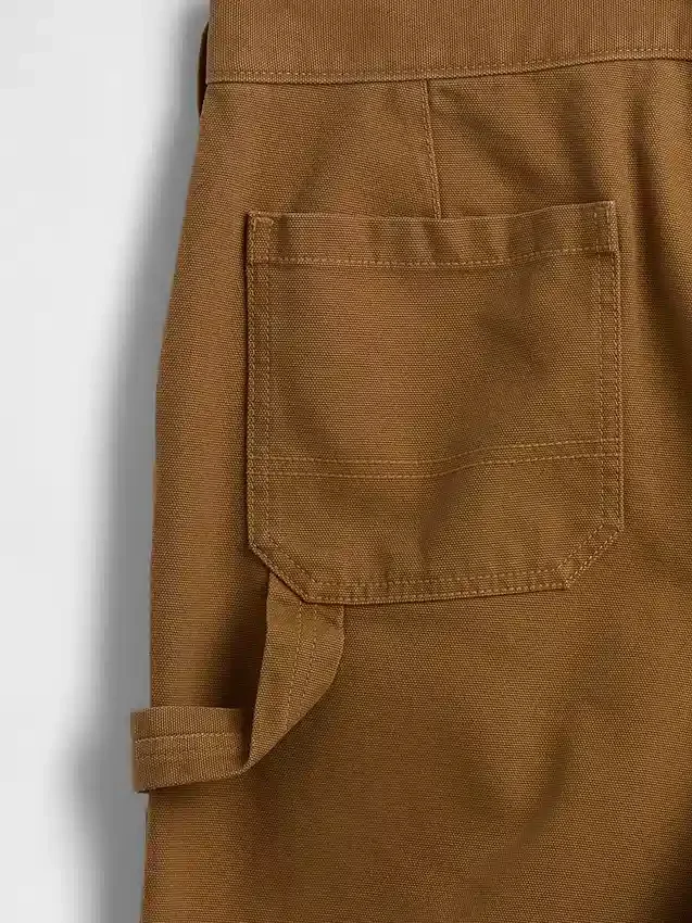 Lose Carpenter-Hose im 90er-Jahre-Stil aus Canvas mit doppelten Knieverstärkungen