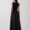 Maxikleid aus verschiedenen Materialien mit tief sitzender Taille