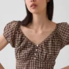 Maxikleid mit V-Ausschnitt und Rüschen am Saum