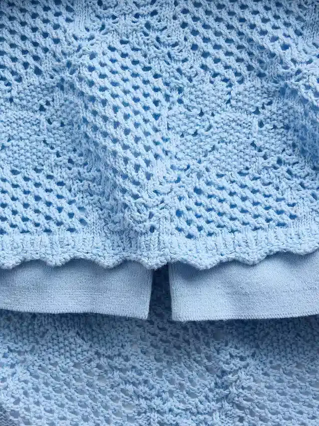 Mini-Pullover-Rock aus 100 % Baumwolle mit Pointelle-Muster