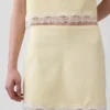 Mini-Skort aus Leinenmischung mit Spitzenbesatz
