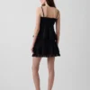 Mini-Skort mit Biesen und Spitzenbesatz