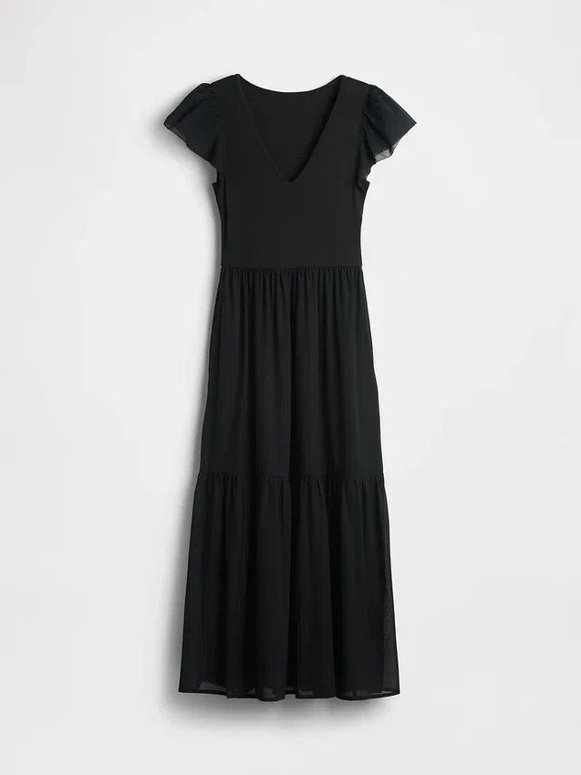 Modernes Maxi-Kleid aus verschiedenen Materialien mit Rüschen