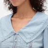 Peplum-Oberteil mit Kragen und V-Ausschnitt
