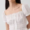 Peplum-Oberteil mit quadratischem Ausschnitt und Spitzenbesatz