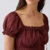 Peplum-Oberteil mit quadratischem Ausschnitt und Spitzenbesatz