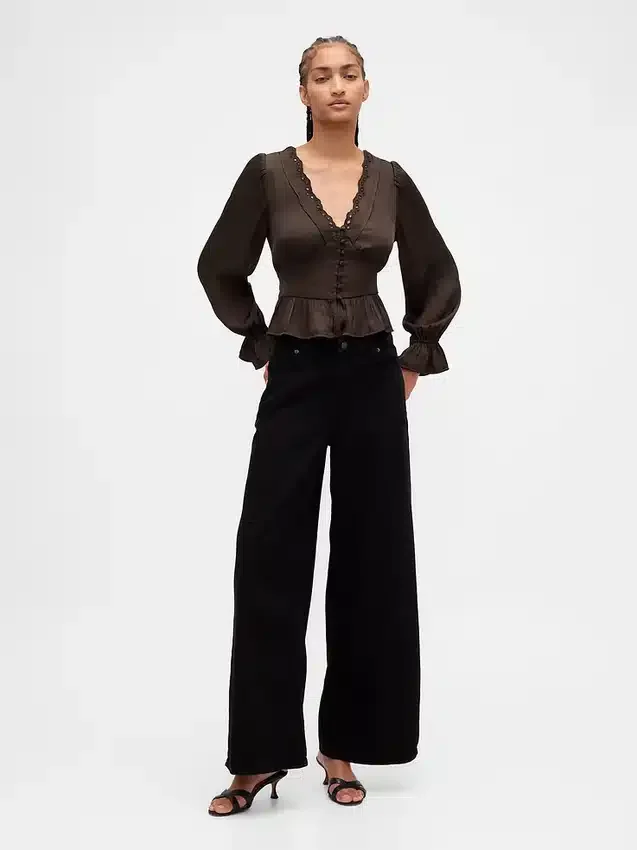 Peplum-Oberteil mit V-Ausschnitt und Lochstickerei