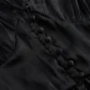 Peplum-Oberteil mit V-Ausschnitt und Lochstickerei