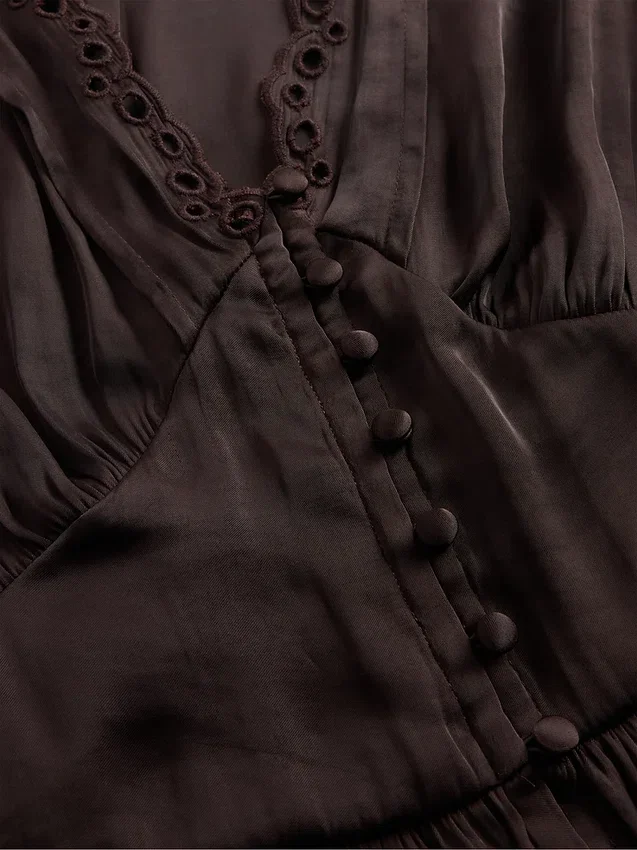 Peplum-Oberteil mit V-Ausschnitt und Lochstickerei