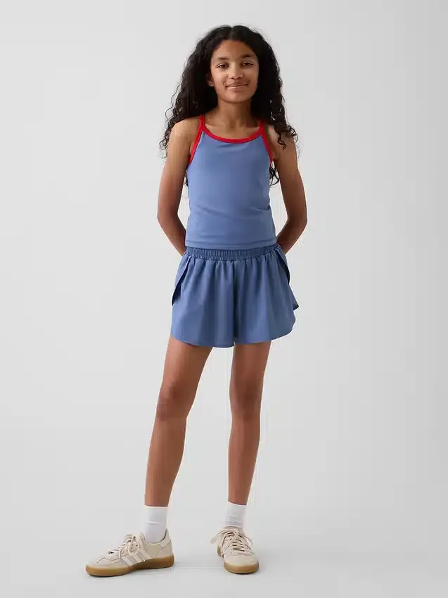 Schnelltrocknende Laufshorts für Kinder mit Schmetterlingssaum