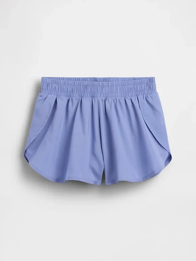 Schnelltrocknende Laufshorts für Kinder mit Schmetterlingssaum
