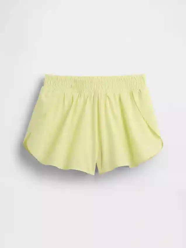 Schnelltrocknende Laufshorts für Kinder mit Schmetterlingssaum
