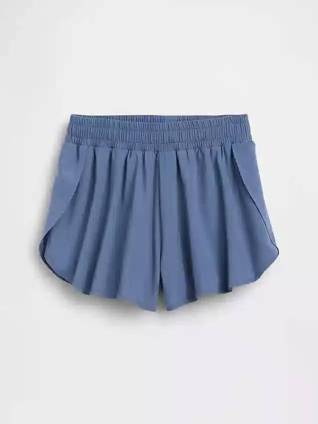 Schnelltrocknende Laufshorts für Kinder mit Schmetterlingssaum