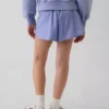 Schnelltrocknende Laufshorts für Kinder mit Schmetterlingssaum