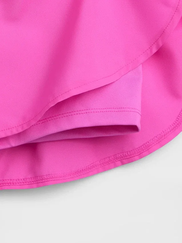 Schnelltrocknende Laufshorts für Kinder mit Schmetterlingssaum