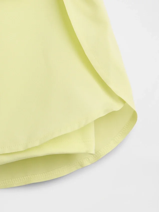 Schnelltrocknende Laufshorts für Kinder mit Schmetterlingssaum